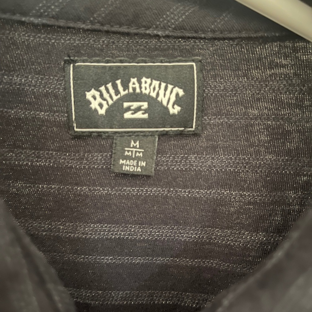 Boys medium polo Billabong never worn black & gray